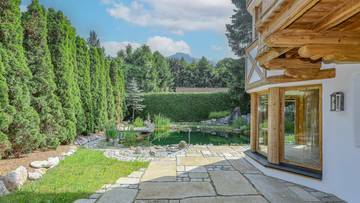 KITZIMMO-Exklusive Luxusvilla mit Freizeitwohnsitz auf der Bichlalm - Immobilien KitzbÃ¼hel.