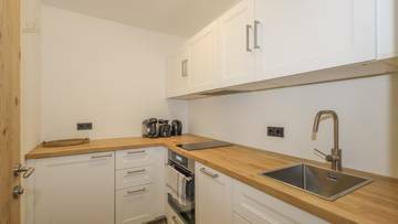 KITZIMMO-Garten Apartment mit touristischer Widmung kaufen - Immobilien KitzbÃ¼hel.