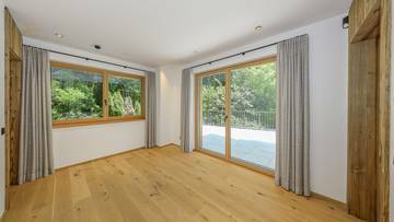 KITZIMMO-Luxus-Neubauvilla mit Pool in Toplage kaufen - Immobilien Ellmau.KITZIMMO-Luxus-Neubauvilla mit Pool in Toplage kaufen - Immobilien Ellmau.