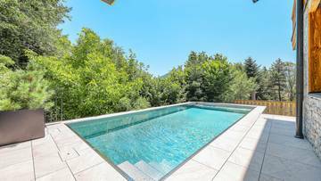 KITZIMMO-Luxus-Neubauvilla mit Pool in Toplage kaufen - Immobilien Ellmau.