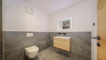 KITZIMMO-Hochwertiges Penthouse in Toplage kaufen - Immobilien St. Johann kaufen.