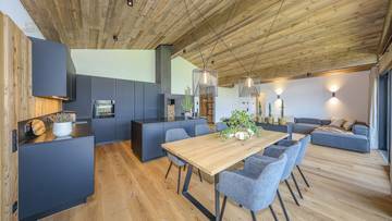 KITZIMMO-Exklusives Luxuspenthouse in Toplage kaufen - Immobilien St. Johann.