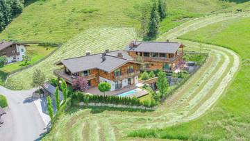 KITZIMMO-Luxuswohnung mit Pool in Toplage kaufen - Immobilie Jochberg.