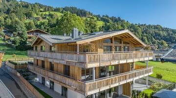 KITZIMMO-Luxuspenthouse sonniger Toplage mit Panorama-Ausblick - Immobilien Brixen.