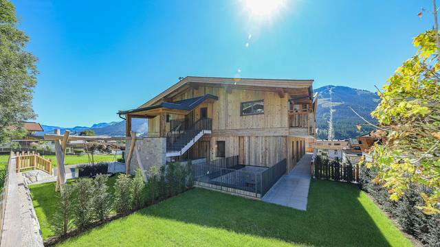 KITZIMMO-Luxuspenthouse sonniger Toplage mit Panorama-Ausblick - Immobilien Brixen.