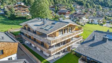 KITZIMMO-Luxuspenthouse sonniger Toplage mit Panorama-Ausblick - Immobilien Brixen.