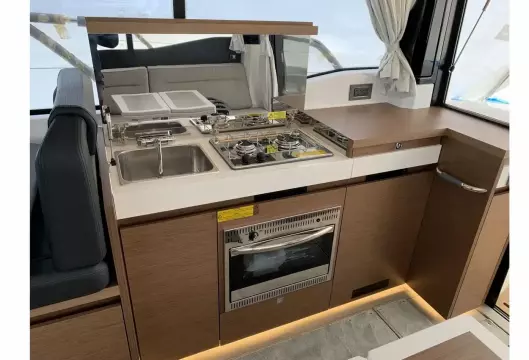 Jeanneau NC 37 twin diesel cruiser - galley with stove, oven and sink