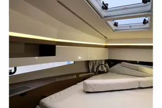 Jeanneau NC 37 twin diesel cruiser - main cabin with 2x hatch to deck