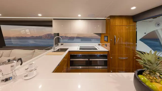 Riviera 78 Motor Yacht Galley 01 Gloss Teak Timber Finish