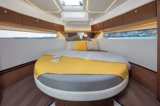 Jeanneau Merry Fisher 1095 - main cabin with double berth and hatch to deck