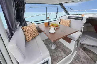 Jeanneau Merry Fisher 795 Series 2 - wheelhouse saloon table with reversible co-pilot seat