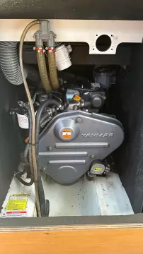 Engine compartment of a 2011 Jeanneau Sun Odyssey 409 sailboat, featuring a Yanmar engine.