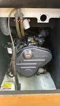Engine compartment of a 2011 Jeanneau Sun Odyssey 409 sailboat, featuring a Yanmar engine.