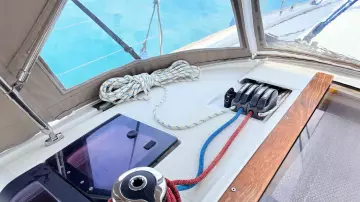Cockpit view of 2011 Jeanneau Sun Odyssey 409 sailboat with ropes and winch.