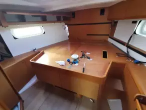Interior cabin of 2017 Jeanneau Sun Odyssey 469 sailboat with wooden furnishings.