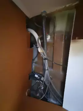 Electrical and plumbing system inside a 2017 Jeanneau Sun Odyssey 469 sailboat.