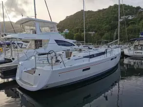 2017 Jeanneau Sun Odyssey 469 sailboat docked in a marina.