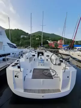 2017 Jeanneau Sun Odyssey 469 sailboat docked in a marina.