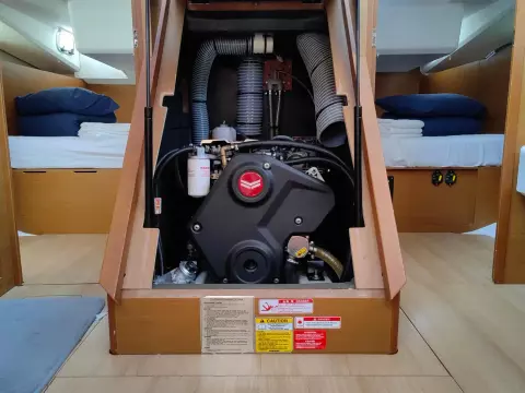 Engine compartment of 2019 Jeanneau Sun Odyssey 440 sailboat, showcasing interior layout and design.