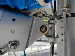 Close-up of Jeanneau Sun Odyssey 440 sailboat rigging, featuring metal fittings and blue sail cover.