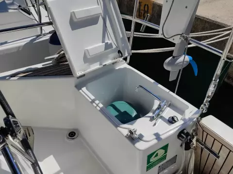 Open storage compartment on 2019 Jeanneau Sun Odyssey 440 sailboat deck.
