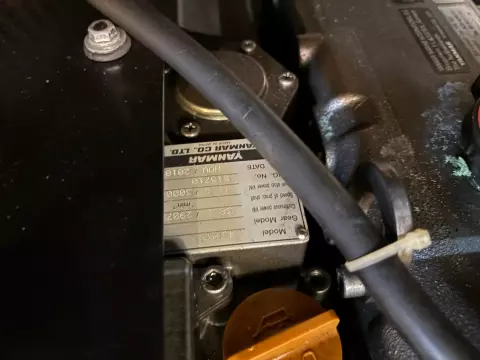 Engine compartment of 2019 Jeanneau Sun Odyssey 479 sailboat, featuring Yanmar components.