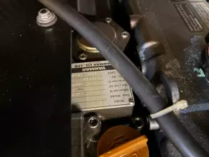 Engine compartment of 2019 Jeanneau Sun Odyssey 479 sailboat, featuring Yanmar components.