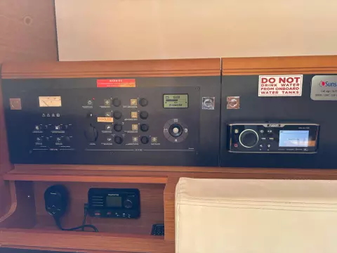 Control panel of 2019 Jeanneau Sun Odyssey 479 yacht with navigation and communication equipment.