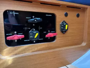 Control panel of a 2019 Jeanneau Sun Odyssey 479 sailboat, featuring battery and breaker switches.