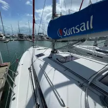 Jeanneau Sun Odyssey 440 sailboat docked at marina, featuring Sunsail branding, 2020 model.