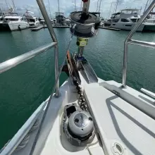 Jeanneau Sun Odyssey 440 (2020) anchor system at marina, surrounded by yachts.