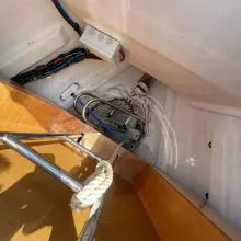 Interior view of a 2020 Jeanneau Sun Odyssey 440 sailboat showing ropes and wiring.