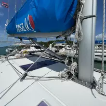 Jeanneau Sun Odyssey 440 sailboat deck with rigging and blue sail cover, 2020 model.