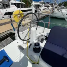 Cockpit of 2020 Jeanneau Sun Odyssey 440 sailboat, featuring steering wheel and winch.