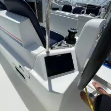 Cockpit of 2020 Jeanneau Sun Odyssey 440 sailboat with navigation equipment and steering wheel.