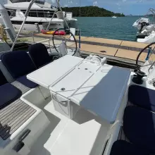Cockpit of 2020 Jeanneau Sun Odyssey 440 yacht docked by the sea.