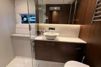 Luxurious bathroom in 2024 Princess F50 yacht with modern fixtures and elegant design.