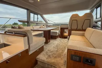 Luxurious interior of 2024 Princess F50 yacht with elegant seating and modern design.
