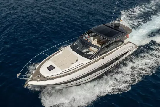 2023 Princess V50 Open yacht cruising on open blue waters.