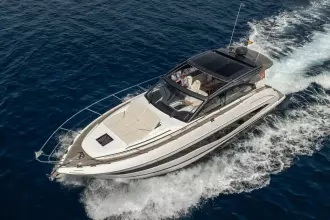 2023 Princess V50 Open yacht cruising on open blue waters.