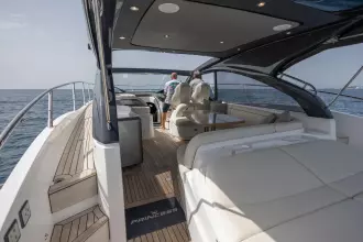 2023 Princess V50 Open yacht with spacious deck and luxurious seating on open water.