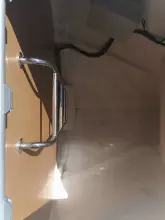 Interior view of 2013 Jeanneau Sun Odyssey 469 sailboat, featuring a metal handle and wiring.