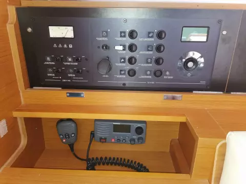 Control panel of 2013 Jeanneau Sun Odyssey 469 sailboat with communication equipment.