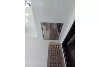 Stainless steel hatch on 2020 Lagoon 42 yacht interior.