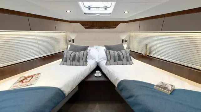 Luxurious cabin interior of 2025 Fairline Targa 50 Open yacht with twin beds.