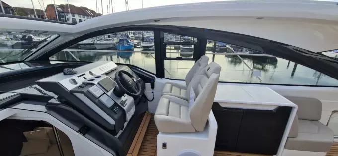 2025 Fairline Targa 45 Open yacht cockpit with modern controls and seating.