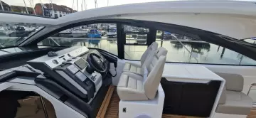 2025 Fairline Targa 45 Open yacht cockpit with modern controls and seating.