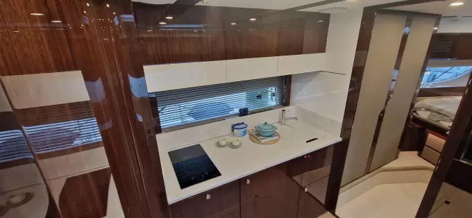 Luxurious kitchen interior of 2025 Fairline Targa 45 Open yacht.