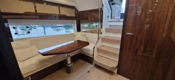 Interior of 2025 Fairline Targa 45 Open yacht with elegant seating and wooden finishes.