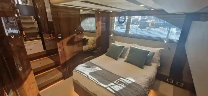 Luxurious bedroom interior of 2025 Fairline Targa 45 Open yacht with modern design.